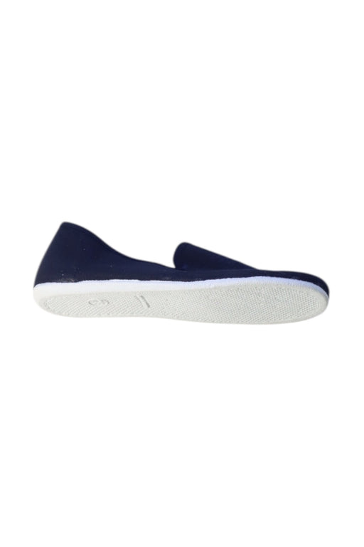 A Navy Flats from Jacadi in size 5T for neutral. (Front View)