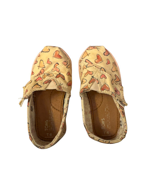 A Beige Slip Ons from Toms in size 18-24M for girl. (Front View)