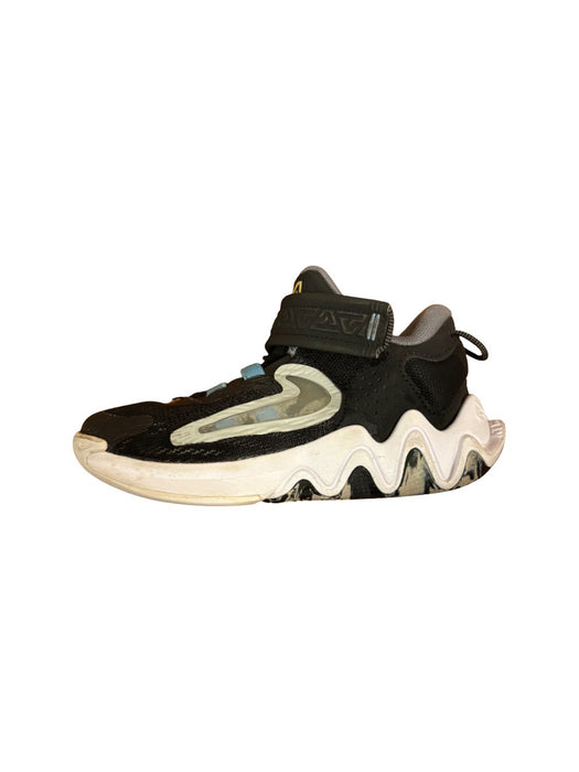 A Black Sneakers from Nike in size 4T for boy. (Back View)