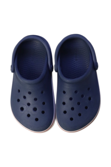 A Navy Slip Ons from Crocs in size 6T for neutral. (Back View)