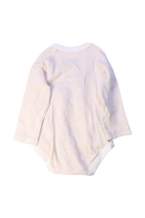 A Beige Long Sleeve Bodysuits from Natures Purest in size 6-12M for girl. (Back View)
