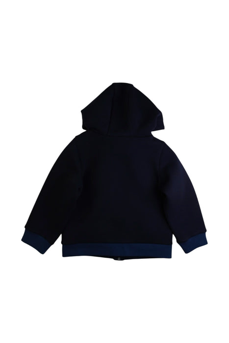 A Blue Lightweight Jackets from Jacadi in size 4T for boy. (Back View)