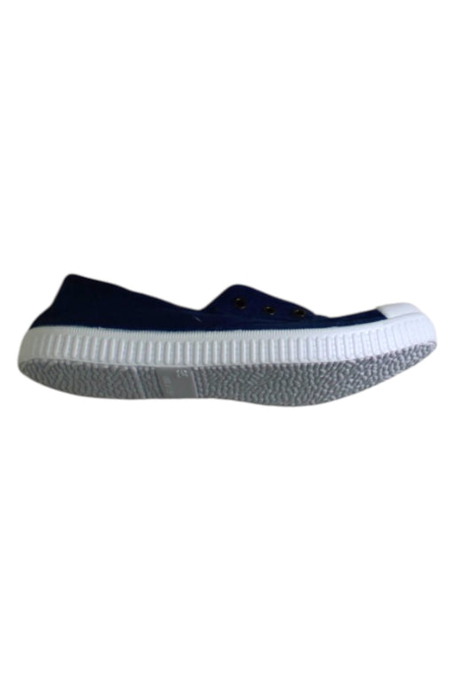 A Navy Slip Ons from Boden in size 10Y for neutral. (Front View)