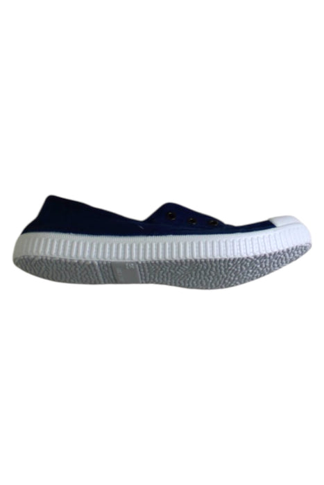 A Navy Slip Ons from Boden in size 10Y for neutral. (Front View)