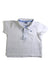 A White Short Sleeve Polos from Janie & Jack in size 6-12M for boy. (Front View)