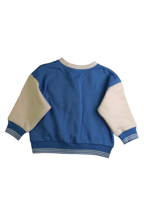 A Blue Lightweight Jackets from Petit Bateau in size 12-18M for boy. (Back View)