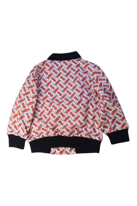 A Red Lightweight Jackets from Burberry in size 12-18M for boy. (Back View)