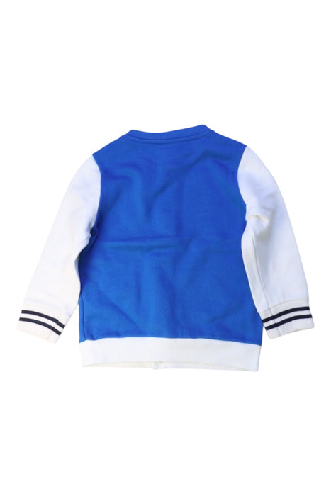A Blue Lightweight Jackets from Petit Bateau in size 12-18M for boy. (Back View)