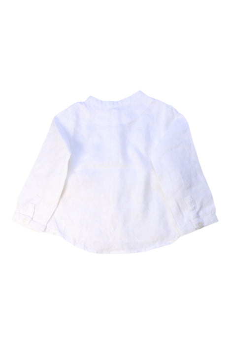 A White Long Sleeve Shirts from Nanos in size 6-12M for boy. (Back View)