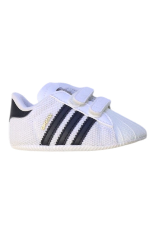 A White Sneakers from Adidas in size 6-12M for neutral. (Front View)