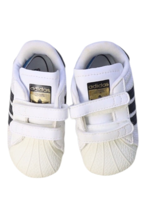 A White Sneakers from Adidas in size 6-12M for neutral. (Back View)