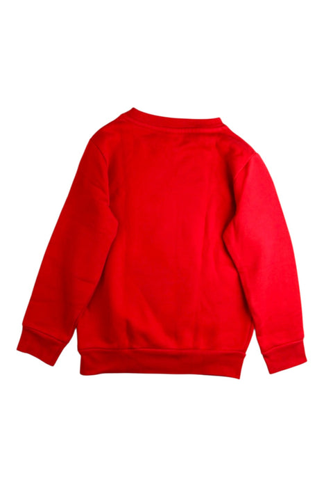 A Red Crewneck Sweatshirts from Petit Bateau in size 6T for boy. (Back View)