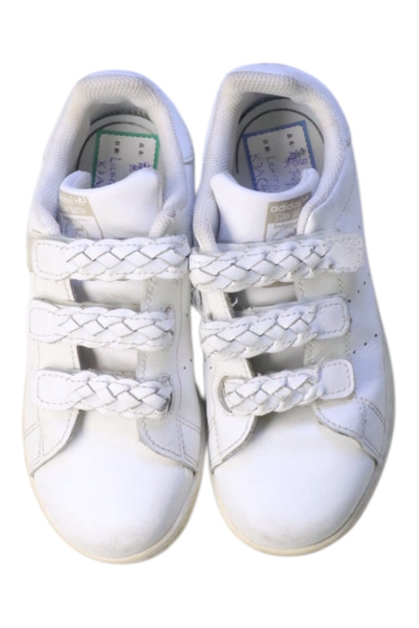 A White Sneakers from Adidas in size 6T for girl. (Back View)