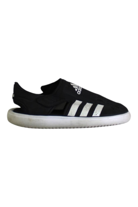 A Black Slip Ons from Adidas in size 7Y for boy. (Front View)