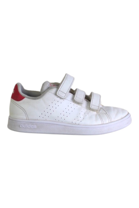 A White Sneakers from Adidas in size 6T for girl. (Front View)