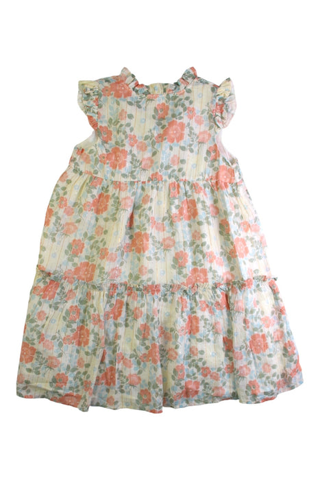 A White Sleeveless Dresses from Louis Louise in size 8Y for girl. (Back View)