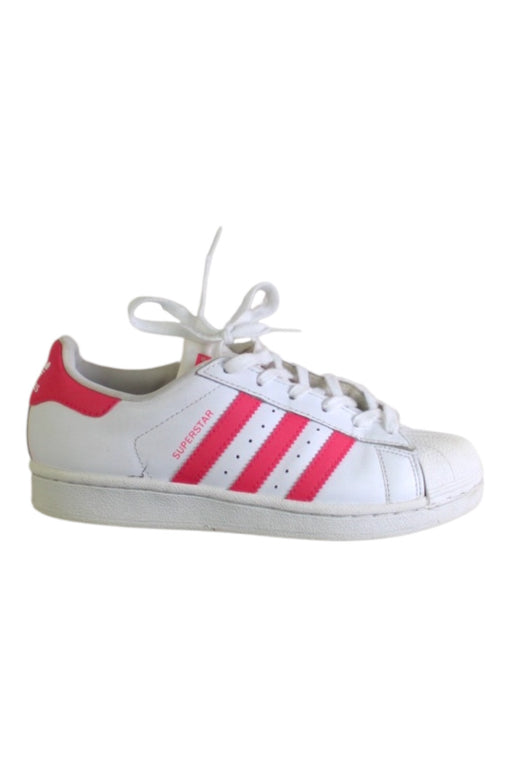 A White Sneakers from Adidas in size 10Y for girl. (Front View)