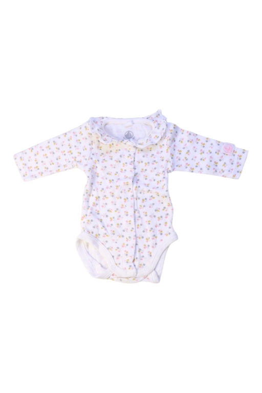 A White Long Sleeve Bodysuits from Petit Bateau in size Newborn for girl. (Front View)