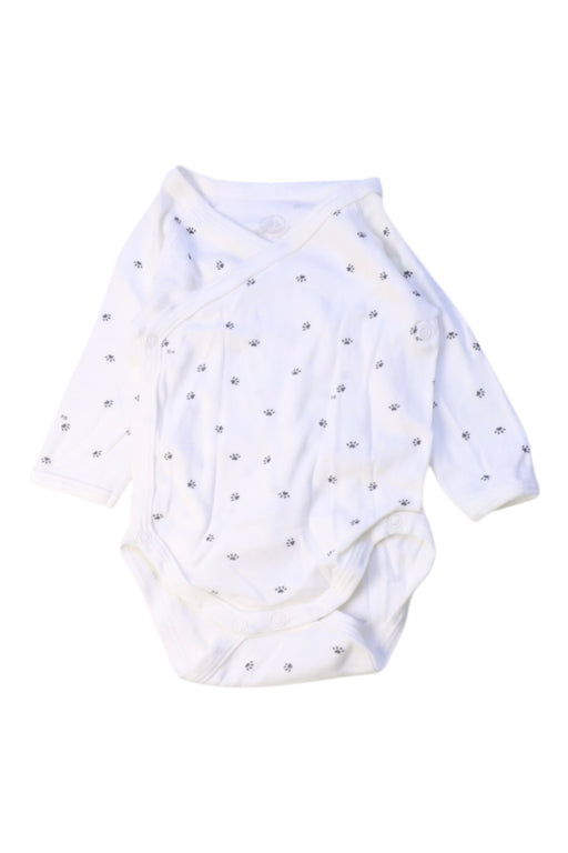 A White Long Sleeve Bodysuits from Petit Bateau in size 0-3M for girl. (Front View)