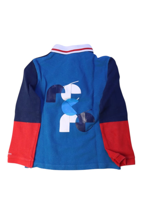 A Navy Long Sleeve Polos from Jacadi in size 6T for boy. (Back View)