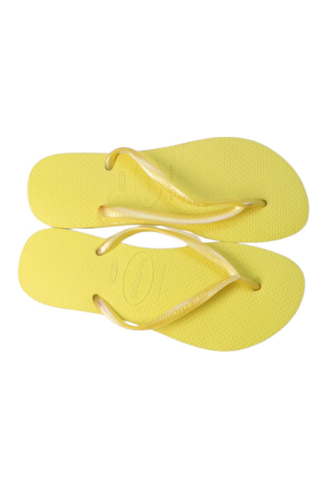 A Yellow Flip Flops from Havaianas in size 13Y for girl. (Front View)