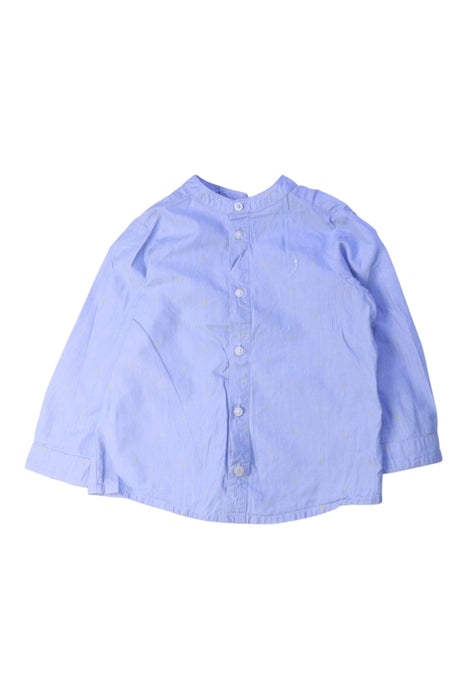 A Blue Long Sleeve Shirts from Jacadi in size 2T for girl. (Front View)