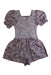 A Purple Short Sleeve Rompers from Seed in size 4T for girl. (Back View)