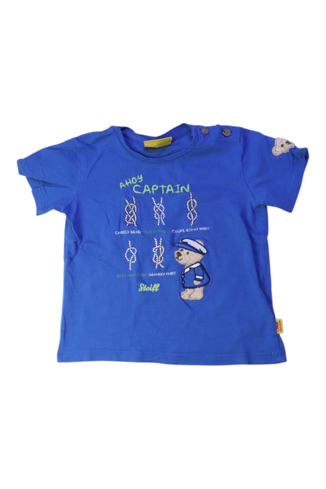 A Blue Short Sleeve T Shirts from Steiff in size 6-12M for boy. (Front View)