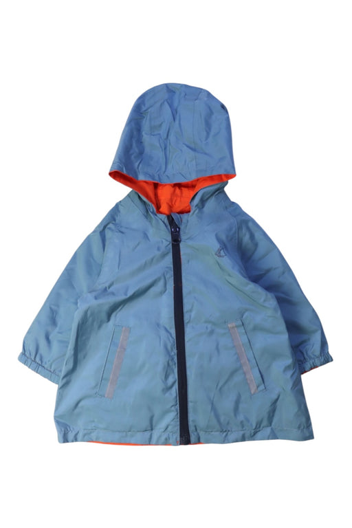 A Blue Rain Jackets from Petit Bateau in size 6-12M for boy. (Front View)