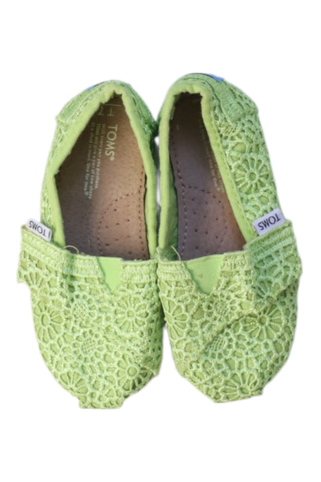 A Green Slip Ons from Toms in size 18-24M for girl. (Back View)