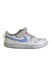 A White Sneakers from Nike in size 5T for girl. (Front View)