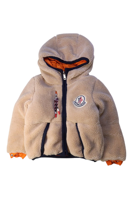 A Beige Puffer/Quilted Jackets from Moncler in size 6-12M for neutral. (Front View)