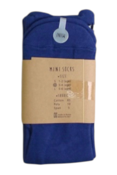 A Blue Socks from Mini Dressing in size 3T for boy. (Back View)
