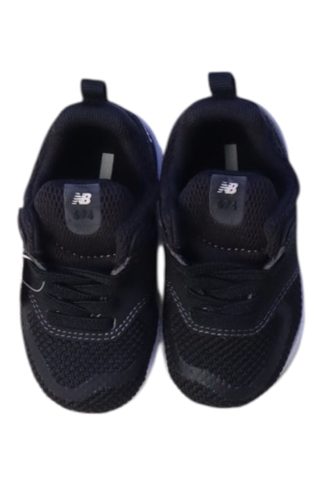 A Black Sneakers from New Balance in size 12-18M for boy. (Back View)