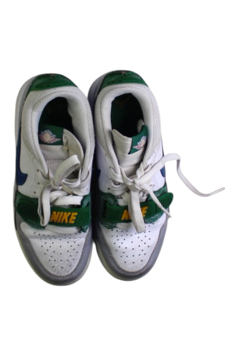 A White Sneakers from Air Jordan in size 11Y for boy. (Back View)
