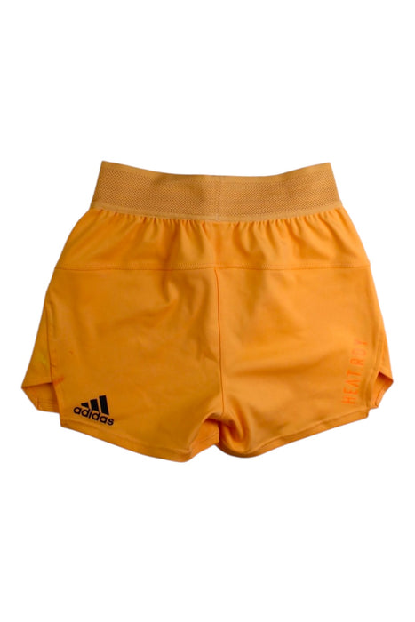 A Orange Shorts from Adidas in size 7Y for girl. (Front View)