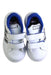 A White Sneakers from Adidas in size 4T for boy. (Back View)