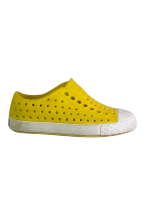 A Yellow Slip Ons from Native Shoes in size 3T for neutral. (Front View)