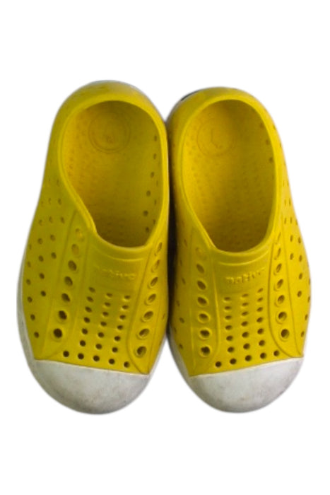A Yellow Slip Ons from Native Shoes in size 3T for neutral. (Back View)