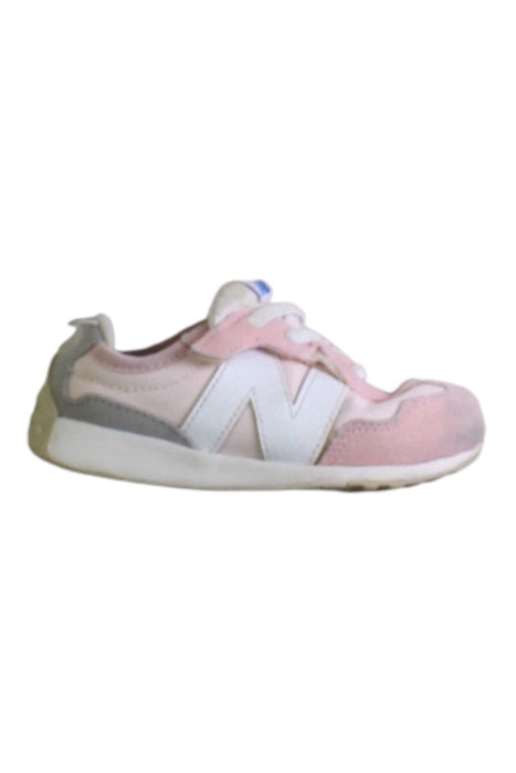 A Pink Sneakers from New Balance in size 3T for girl. (Front View)