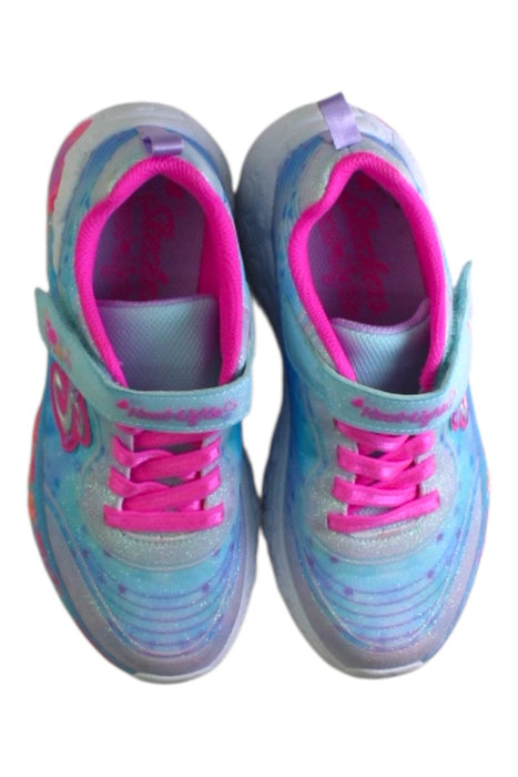 A Blue Sneakers from Skechers in size 7Y for girl. (Back View)