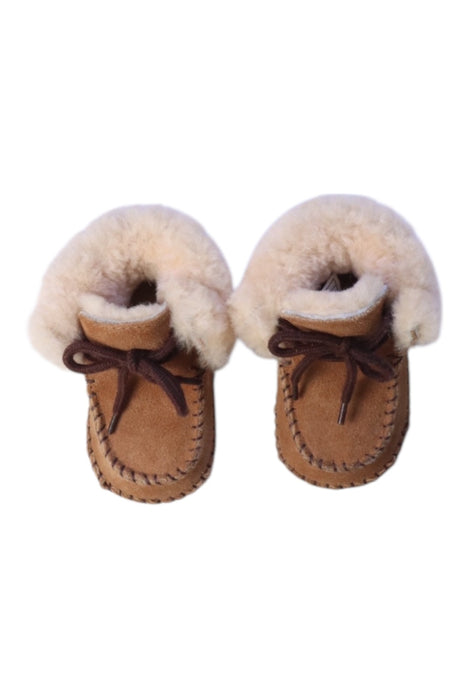 A Brown Booties from UGG in size Newborn for neutral. (Back View)