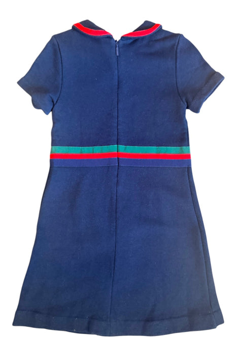 A Navy Short Sleeve Dresses from Gucci in size 5T for girl. (Back View)