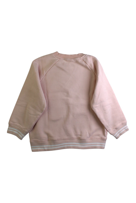 A Pink Crewneck Sweatshirts from Petit Bateau in size 7Y for girl. (Back View)