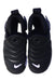 A Black Sneakers from Nike in size 6T for boy. (Back View)