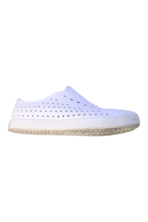 A White Sneakers from Native Shoes in size 11Y for boy. (Front View)