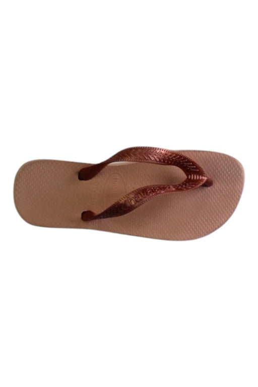A Beige Flip Flops from Havaianas in size 10Y for girl. (Front View)