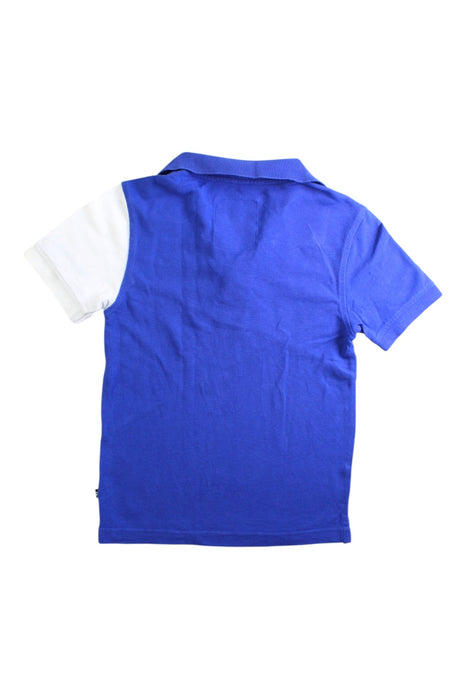 A Blue Short Sleeve Polos from Nautica in size 7Y for boy. (Back View)