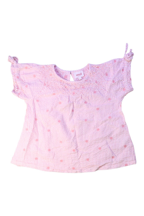 A Pink Short Sleeve Tops from Seed in size 6T for girl. (Front View)