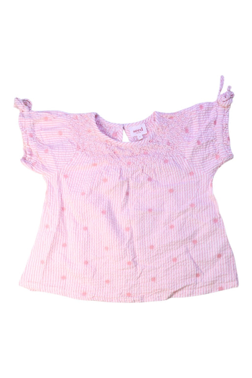A Pink Short Sleeve Tops from Seed in size 6T for girl. (Front View)